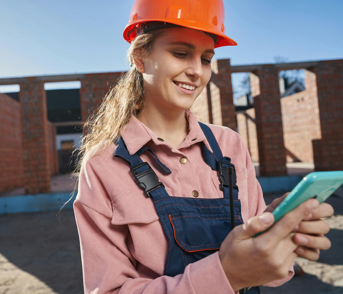 60-Second Lead Response Engine Contractor receiving an instant lead notification on a job site